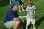 Young Boy Learning Golf